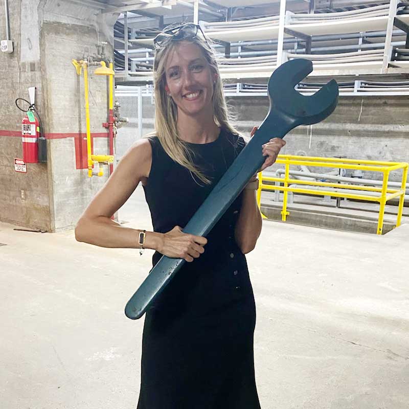 Lindsey holdlng large wrench